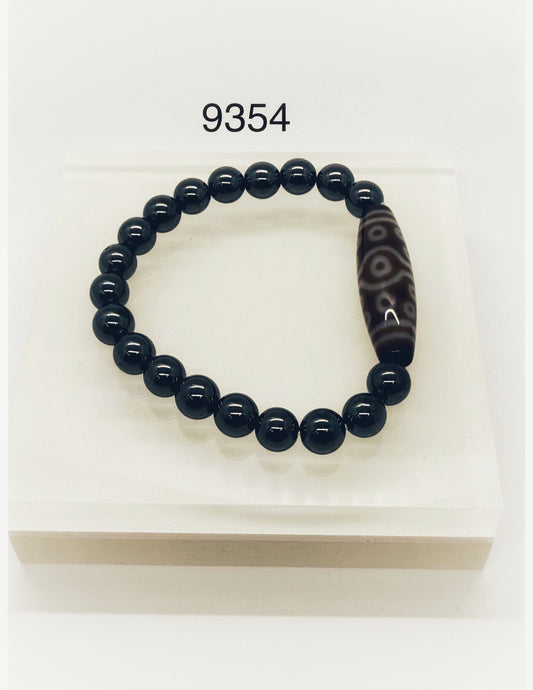 9354 - 15 Eyed DZI with 8mm Hematite Bracelet
