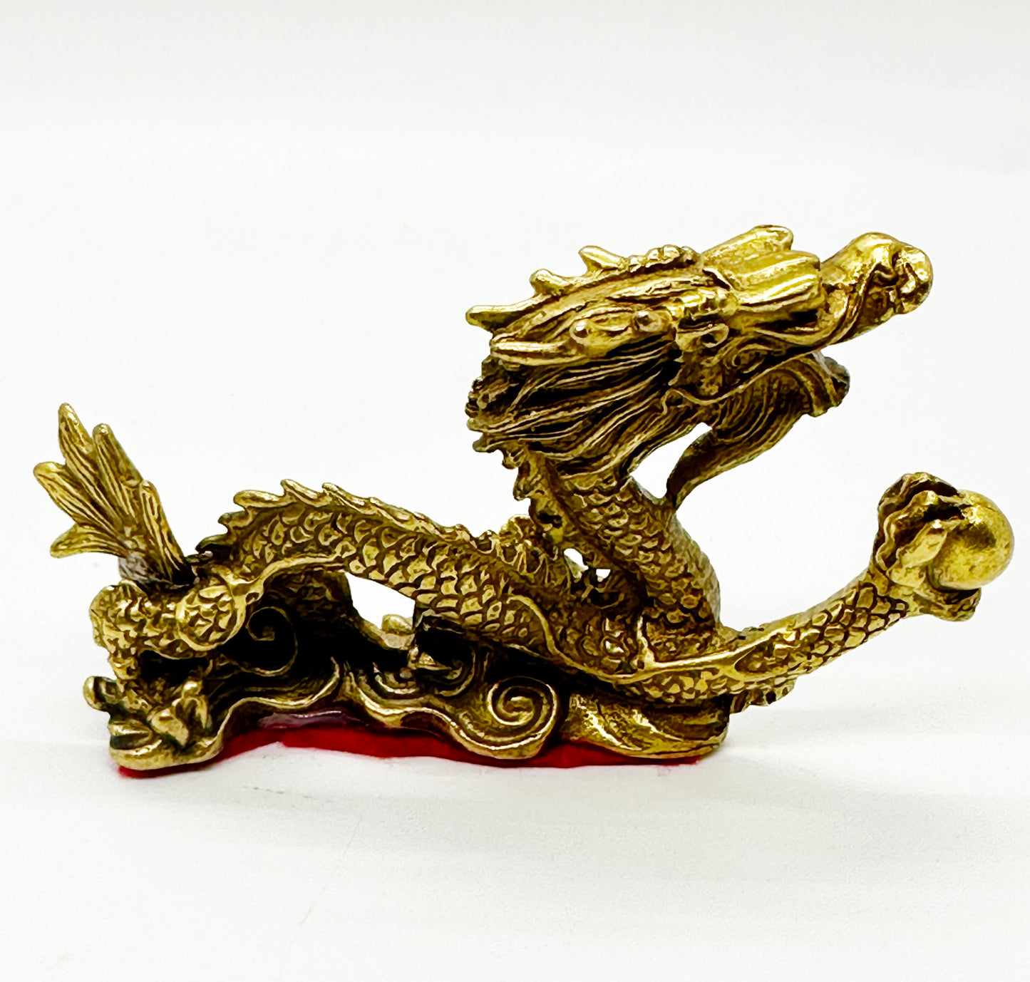 8218 - Brass Dragon Holding A Pearl - 2.75 Inches Length