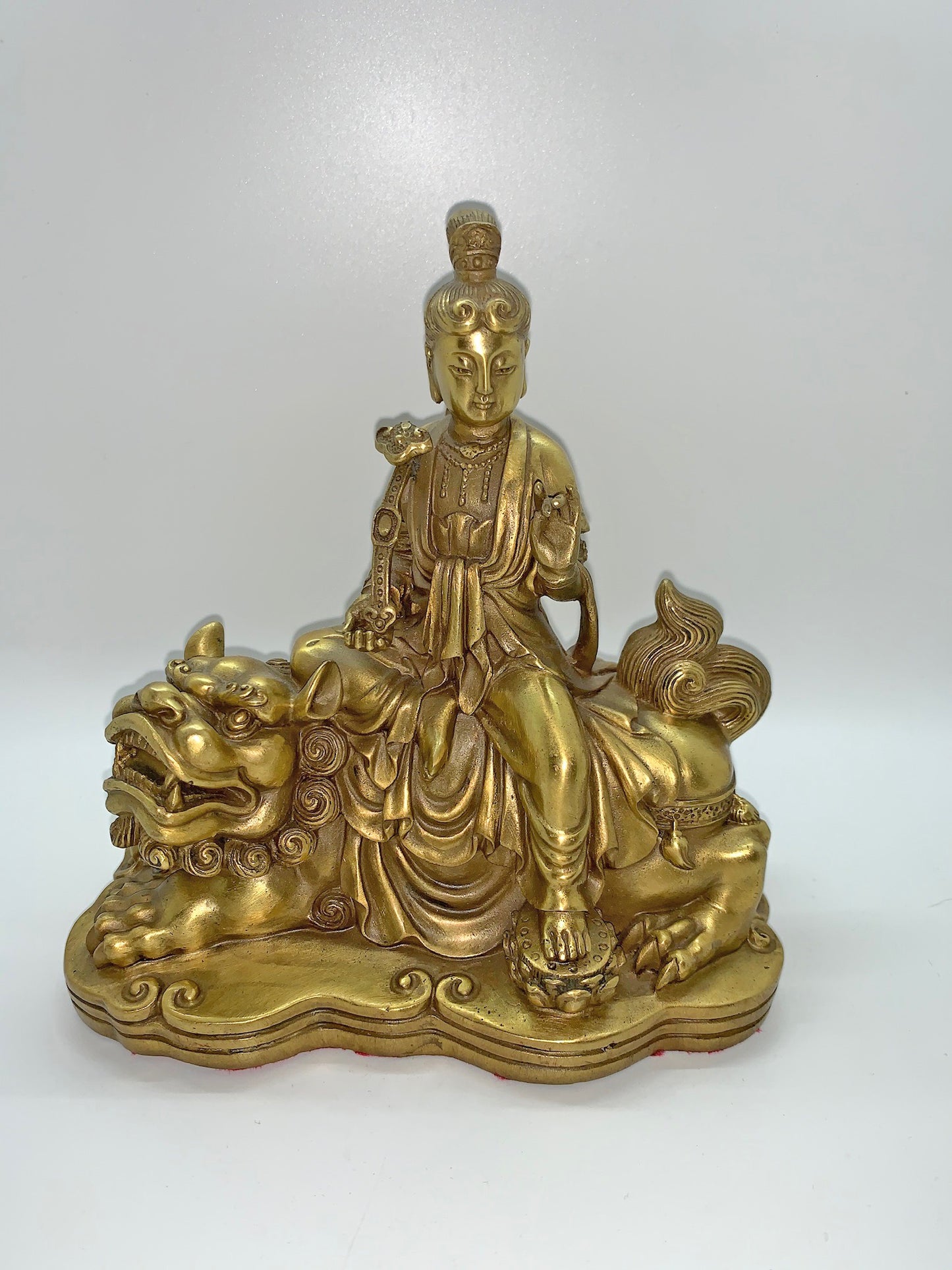 15133 - Kuan Yin Sitting On Snow Lion and Holding Ru Yi