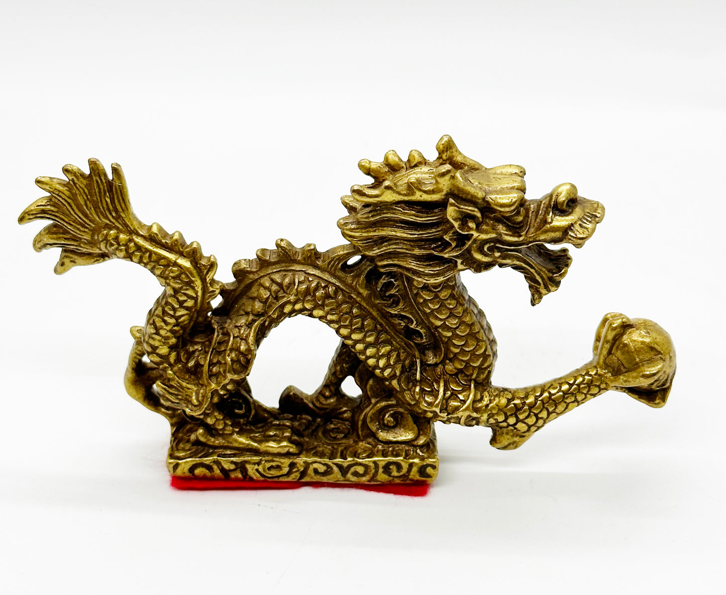 13206 - Brass Dragon Holding A Pearl - 5 Inches Length