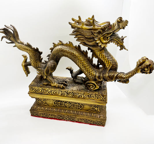 9923 - Brass Dragon Holding A Pearl - 14 Inches Length