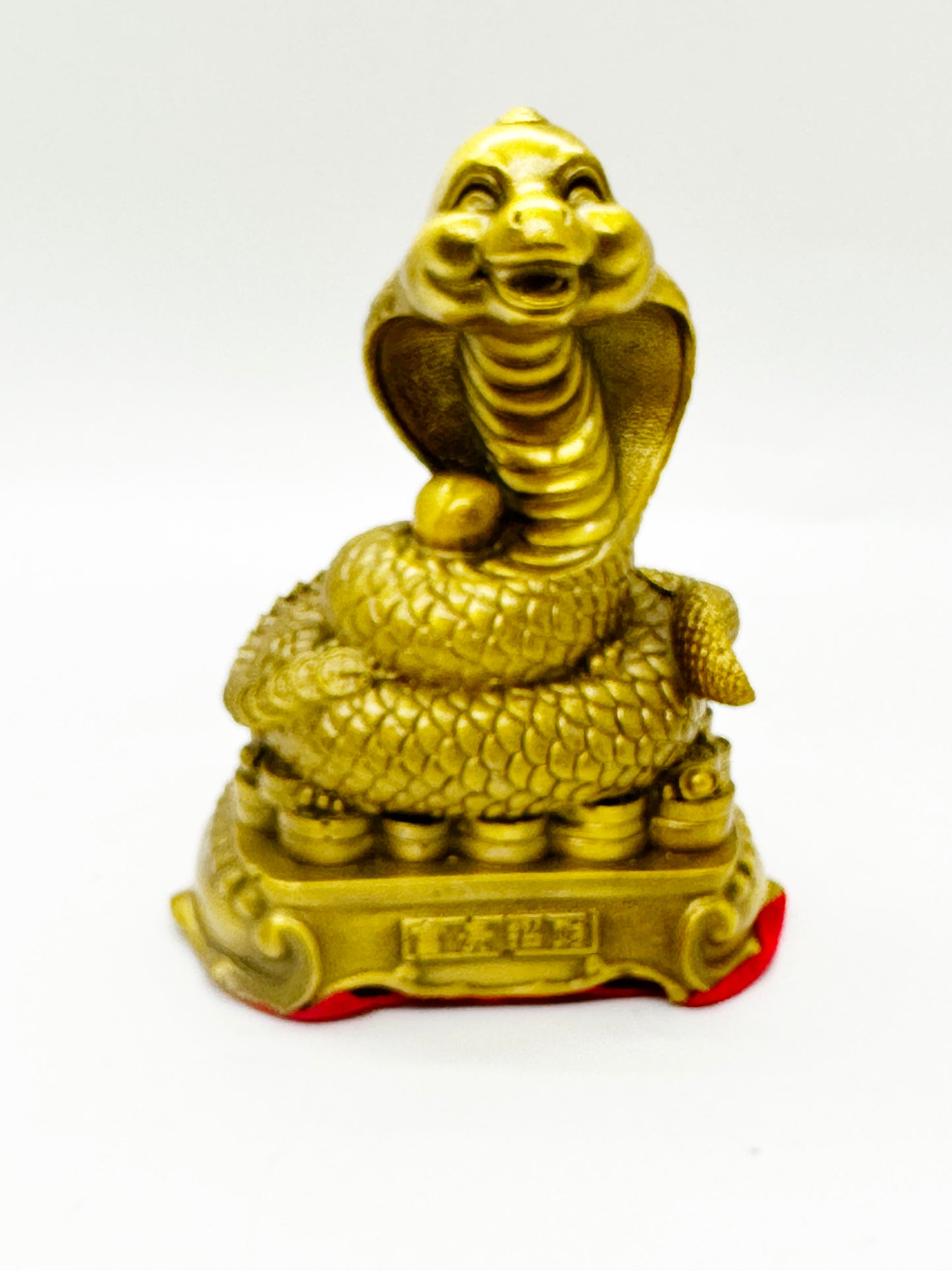 6651 -  Brass Snake Sitting On Coins - 4 3/4 Inches Height