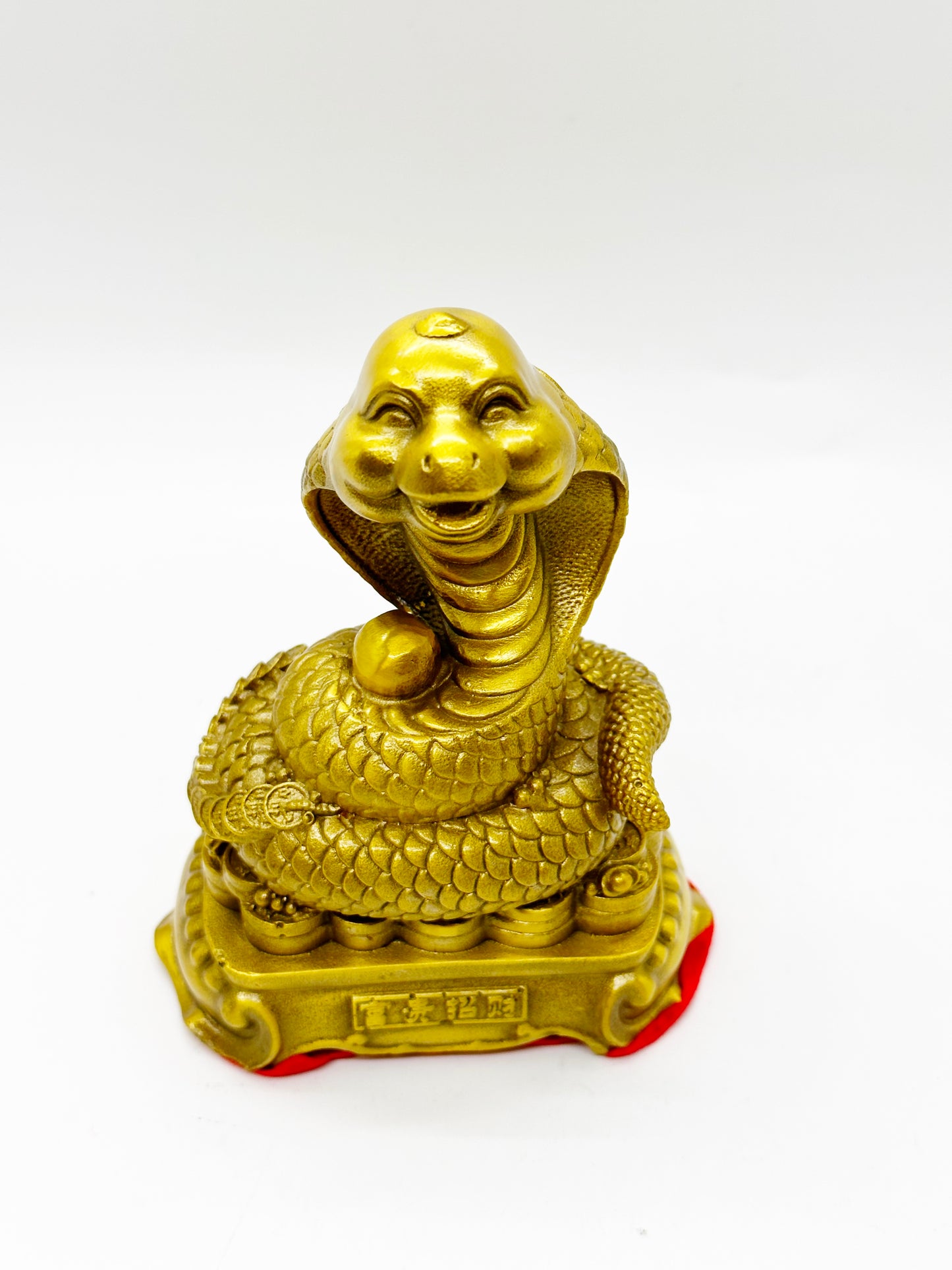 6651 -  Brass Snake Sitting On Coins - 4 3/4 Inches Height