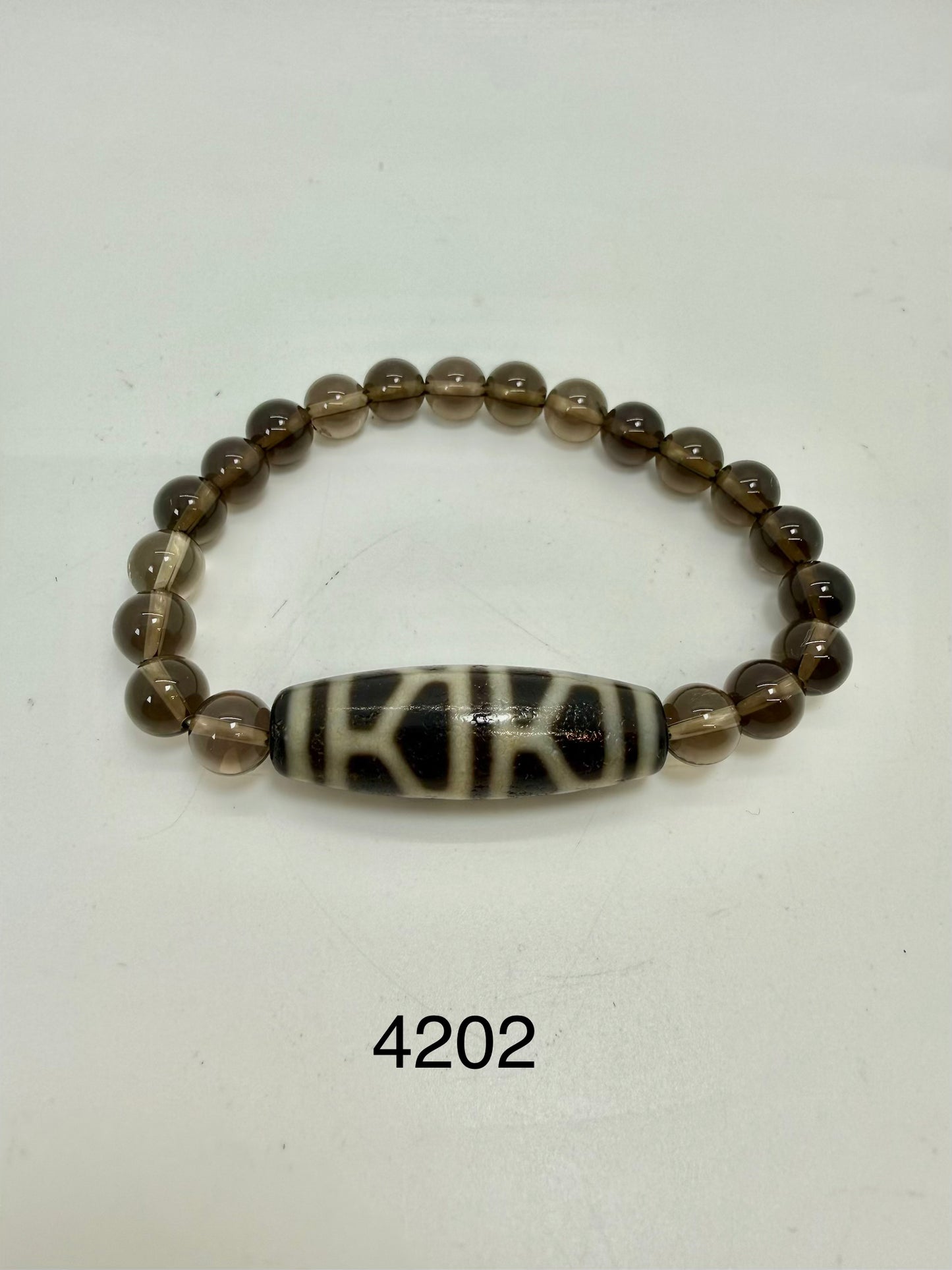 4202 - Tortoise Shell Dzi Bead With 8mm Smooth Smoky Quartz