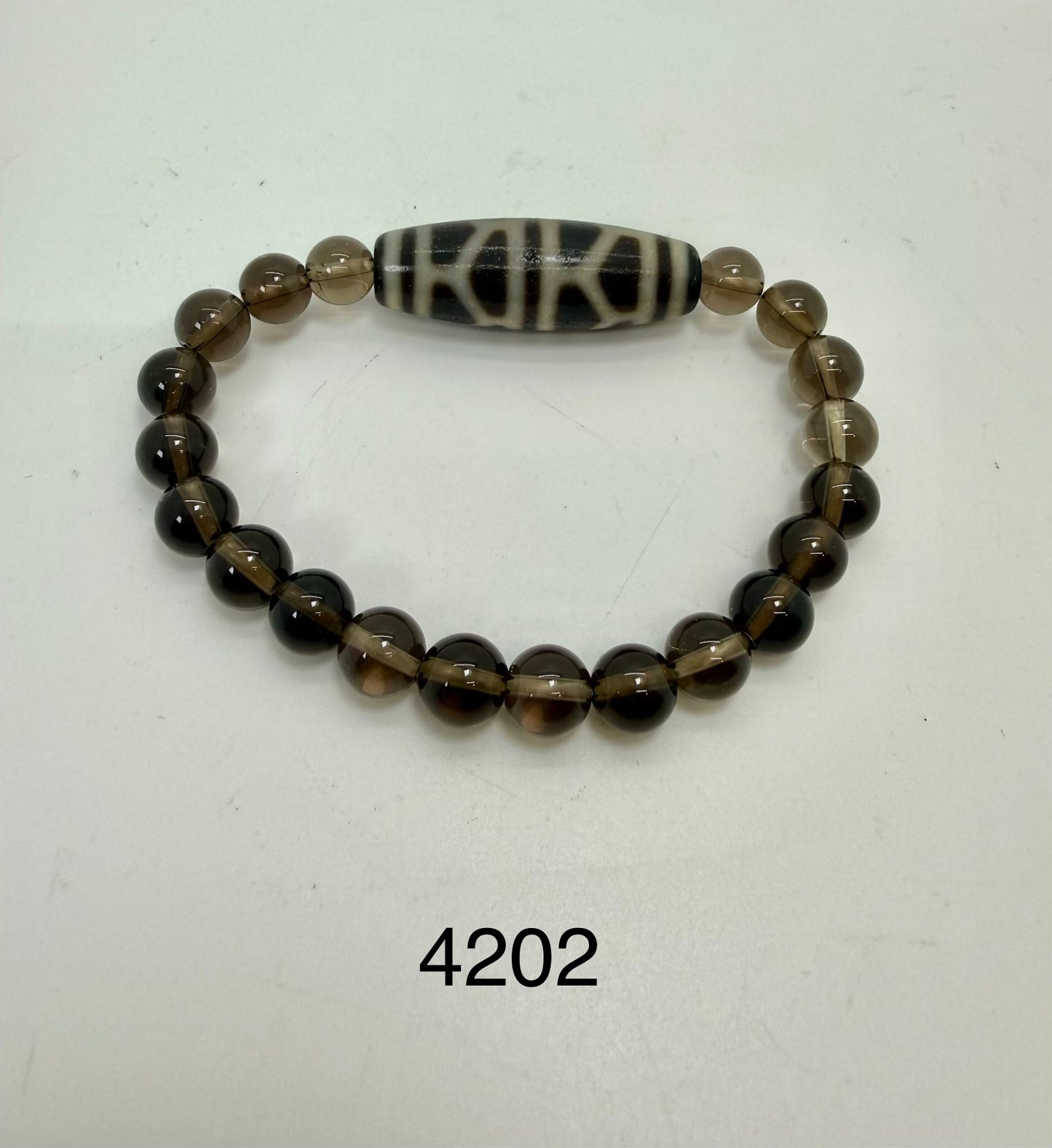 4202 - Tortoise Shell Dzi Bead With 8mm Smooth Smoky Quartz
